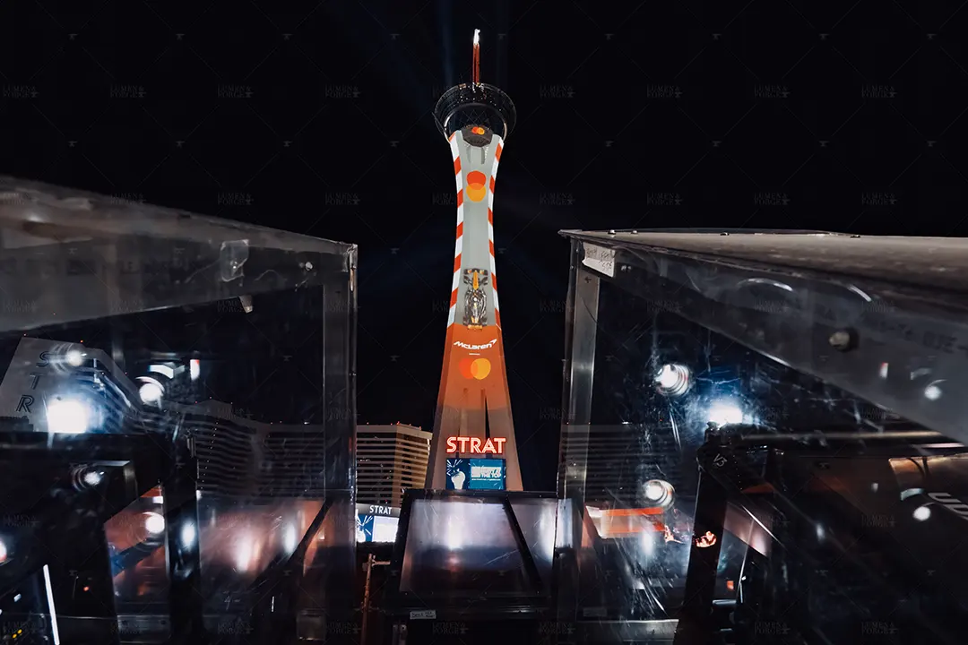 f1 mastercard mclaren stratosphere between projectors night