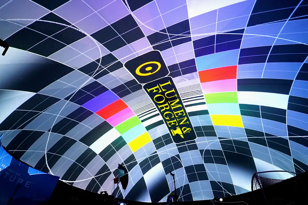 Interior projection mapping transforming venue walls and ceiling with immersive visuals by Lumen and Forge