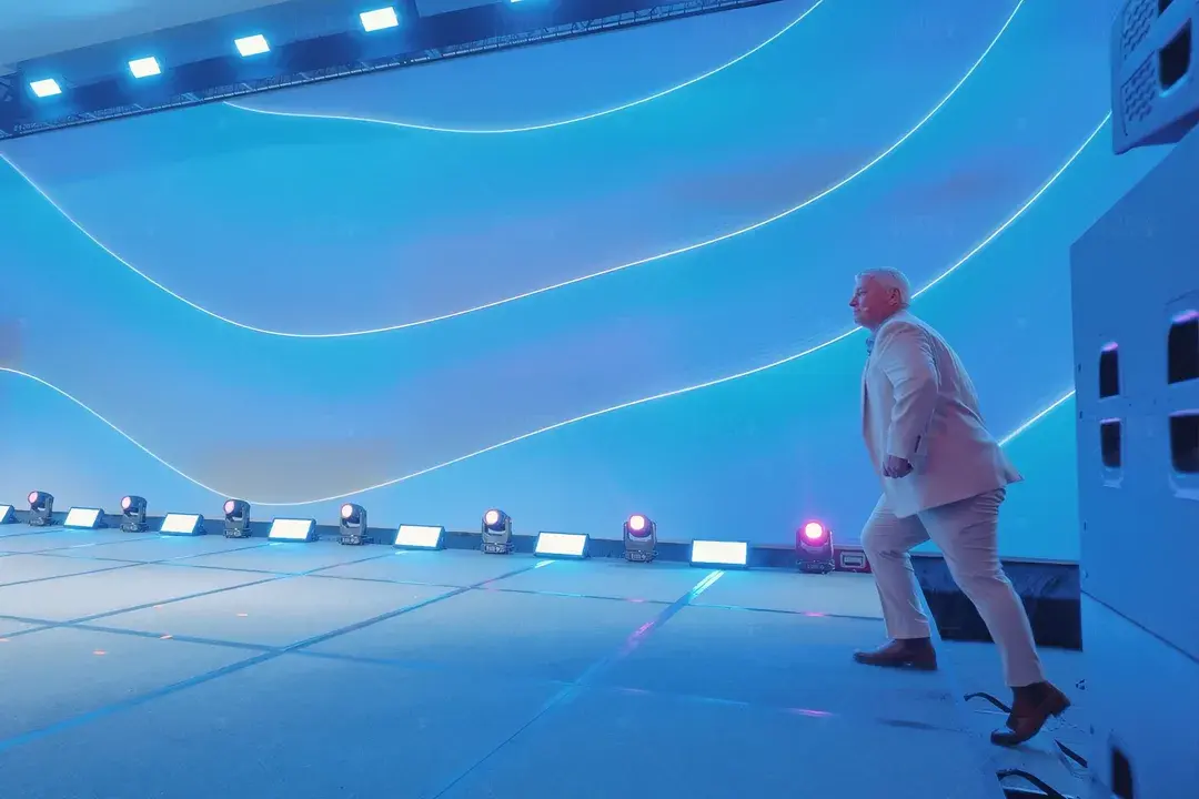 Immersive experiential architecture design featuring dynamic lighting and modern structure by Lumen and Forge