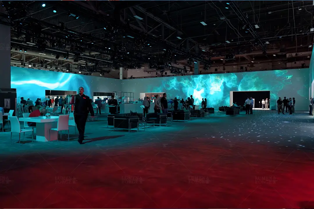 Convention hall wrapped in a wall-to-wall blue cloud projection with lounge seating at the Toyota National Dealer Convention
