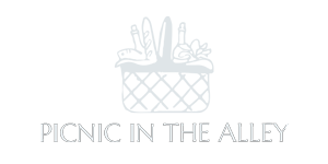 Small, white Picnic in the Alley custom client logo