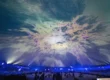 Immersive 360-degree visuals projected onto the world's largest planetarium dome, featuring vibrant pink and blue geometric patterns