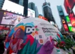 Pop-up dome for the Dominican Republic tourism promotion in Times Square, New York City, featuring vibrant hand-painted artwork, showcasing the nation's culture and attracting visitors.