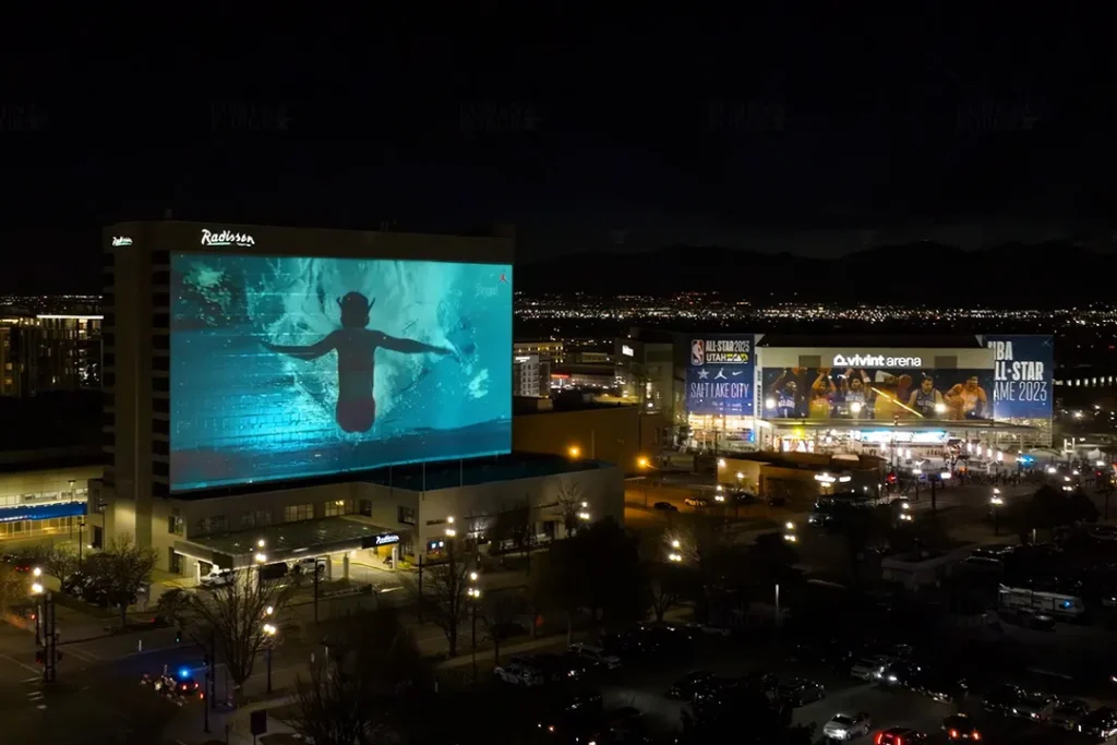 projection mapping at sports events nike all-stars weekend projection on the hotel near vivint arena